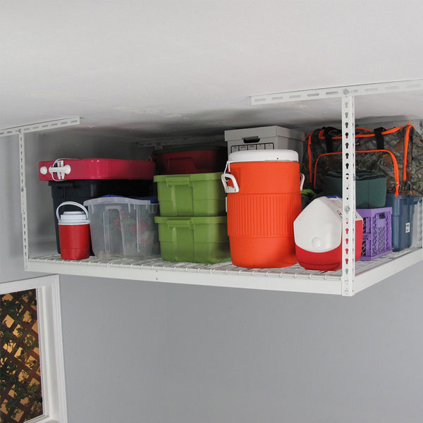white overhead rack with bins and boxes