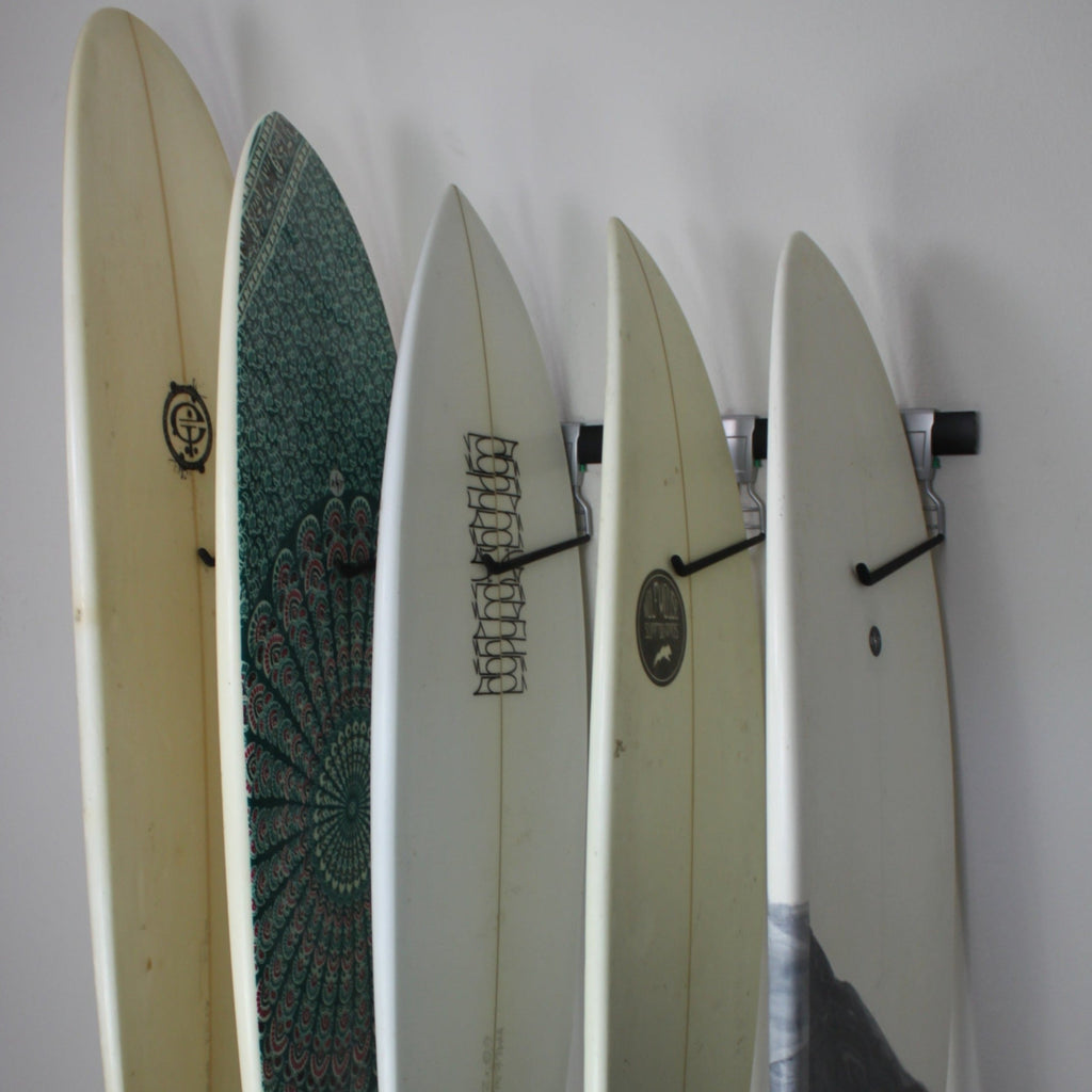 wall rail storage with surfboards 