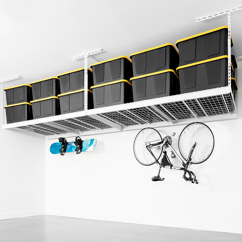 bicycle and snowboard hanging from deck hooks on overhead storage rack