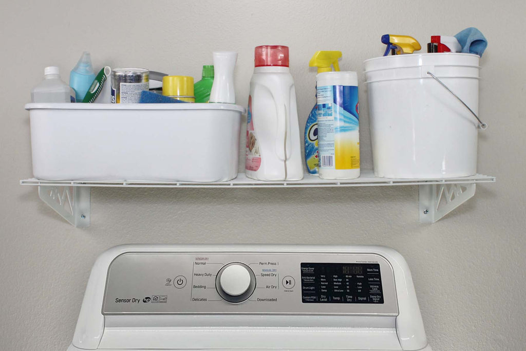 white wall shelf with detergent above washing machine 