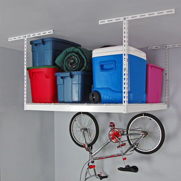 white overhead rack with coolers and bikes
