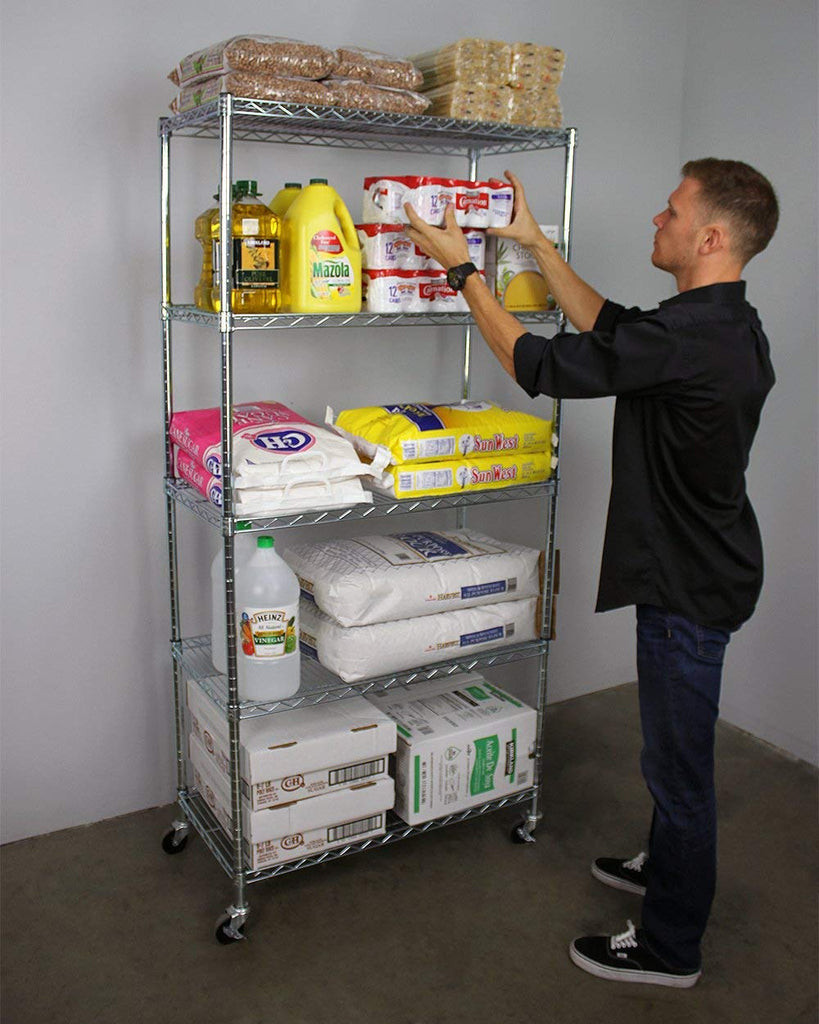 person removing food items from wire shelf