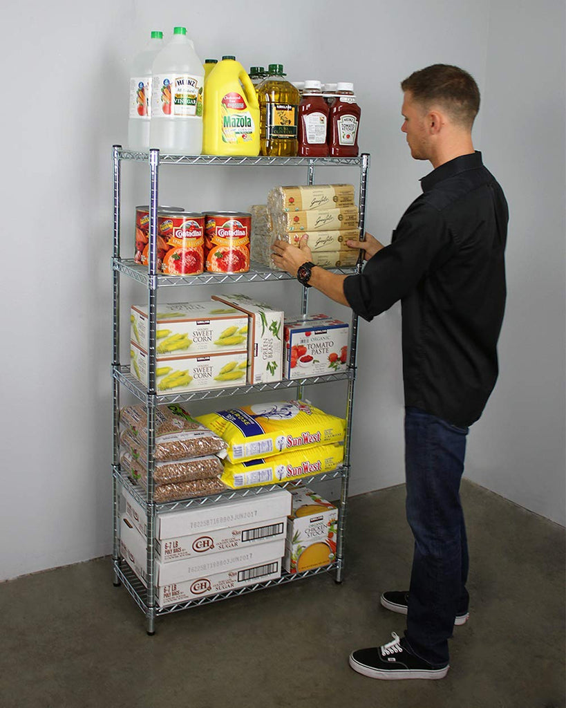 person removing food items from wire shelf