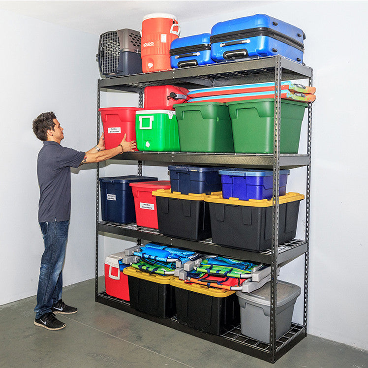 person removing red bin from gray garage shelf