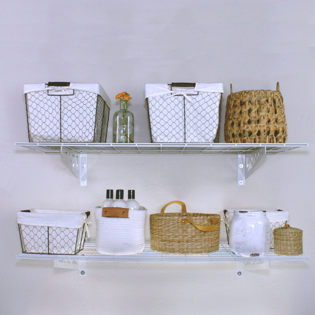 white wall shelves with decorations 