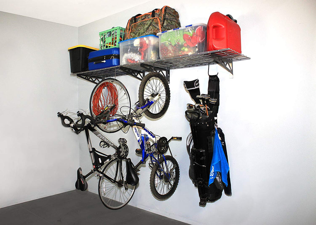 gray wall shelves with bicycle and bins