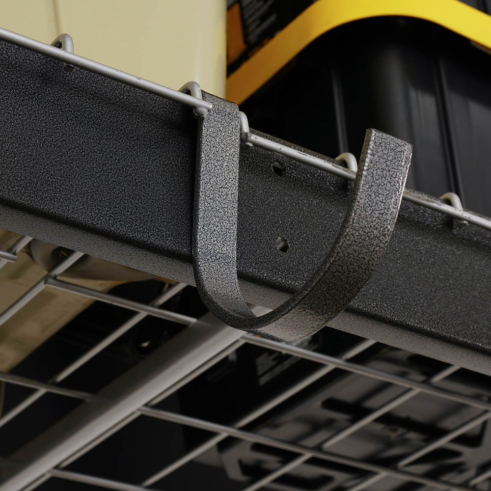 gray rail hook hanging from overhead storage rack